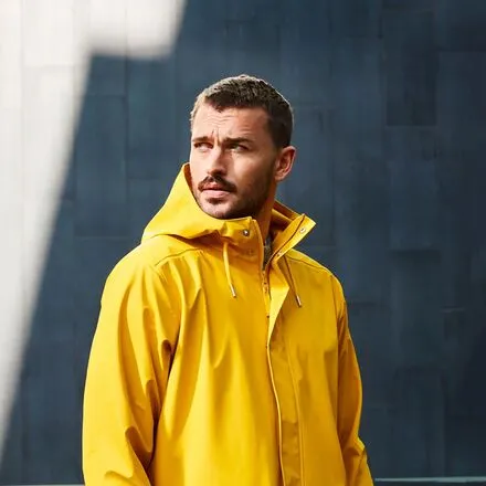 Moss raincoat for men by Helly Hansen, Essential Yellow