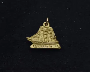 Vintage Old Irondsides Brass Charm