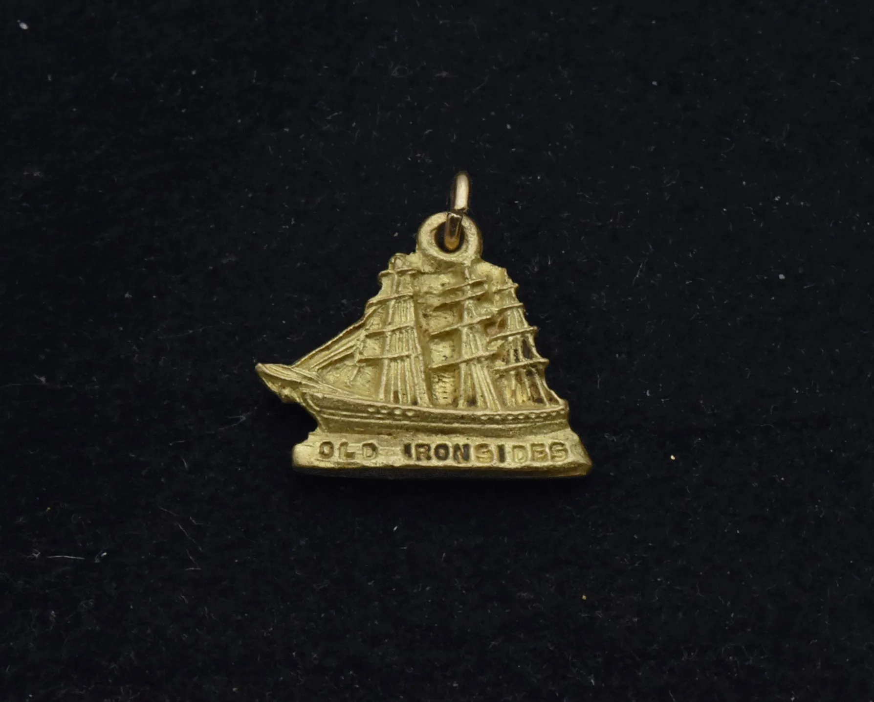 Vintage Old Irondsides Brass Charm